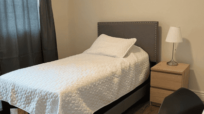 Private room with twin bed and private bathroom