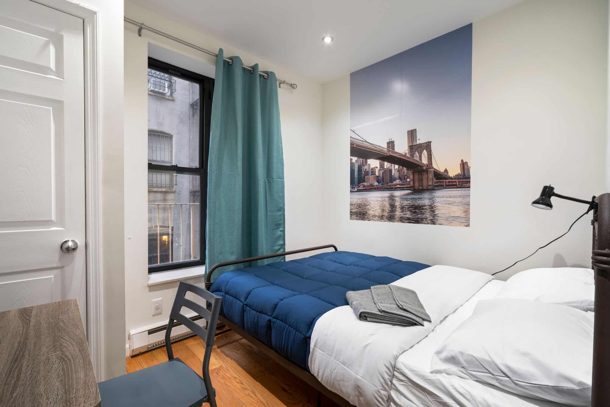 Private room with queen size bed and desk
